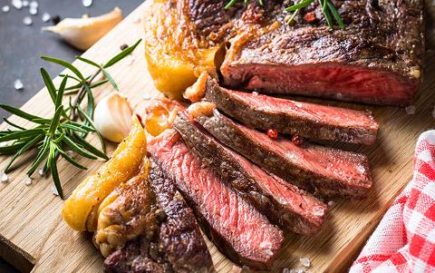 sirloin steak on chopping board